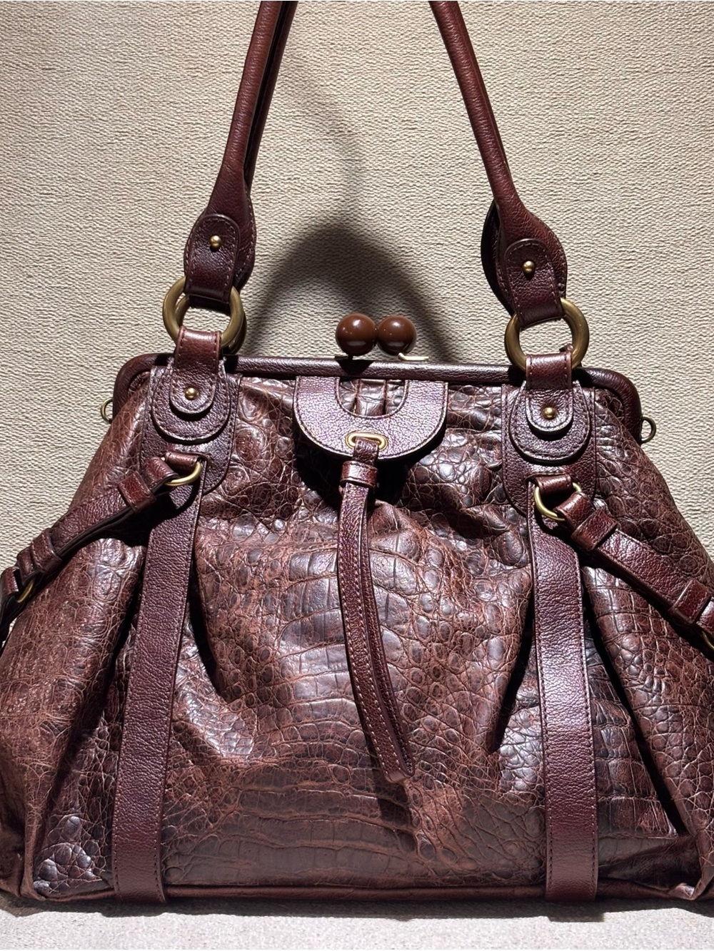 Lockheart Handbag Featuring Crocodile Embossed Leather and Brown Kiss Lock